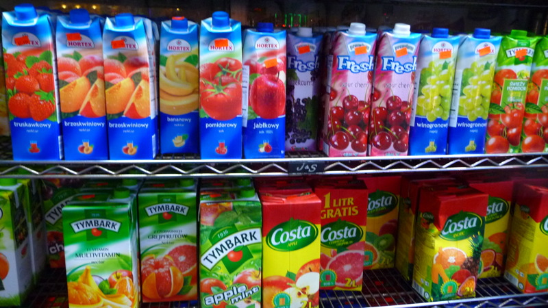Colorful juice boxes outisde a Polish market