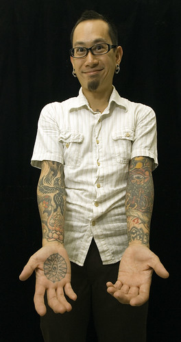 Oey, owner of Sacred Tattoo in Oakland. Photo credit: Chip Chipman