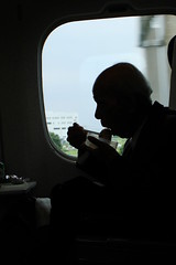 Old man eating in the Shinkansen