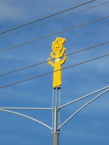 Yellow person Pole by wildwombat1