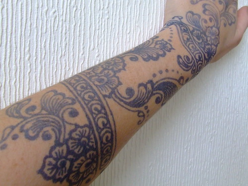 jagua tattoo indian style. indian style jagua arm and hand