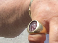 Our tour guides amazing red cameo ring that  was given to him by his dig foreman when he working on a dig for about a year!!