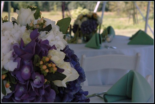 They included cream roses purple hydrangea and green amaranthus