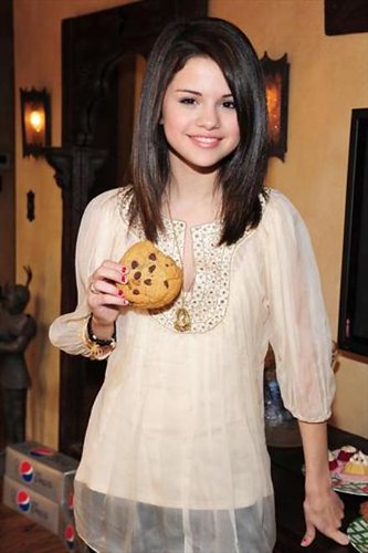 Selena Gomez eating a Cookie! by PureMusicLover