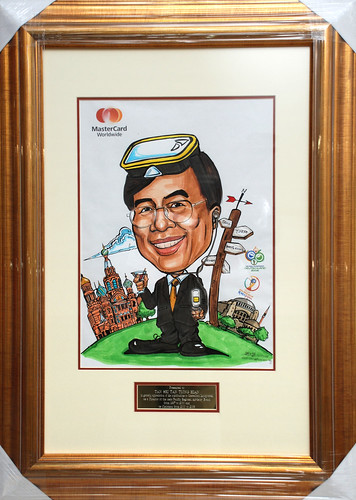Caricature of TST Mastercard colour with frame and inscription