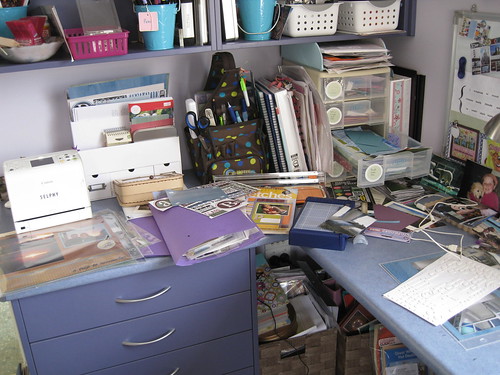 messy scrapbook desk