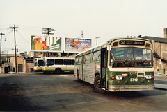 New and old at the CTA West 63rd Place bus terminal. March 1986.
