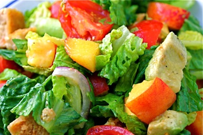 greens with nectarines and avocado