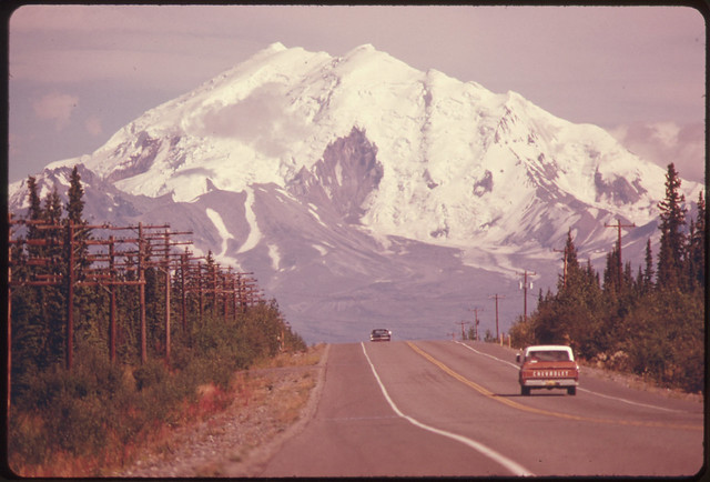 View East Along Glen Highway Toward Mount Drum (Elevation 12002 Feet) and Intersection of Road and Trans-Alaska Pipeline081974 by The US National Archives