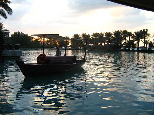 A water taxi in the sunset