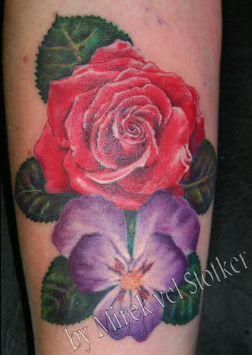 violet flower tattoo. rose and violet flowers tattoo