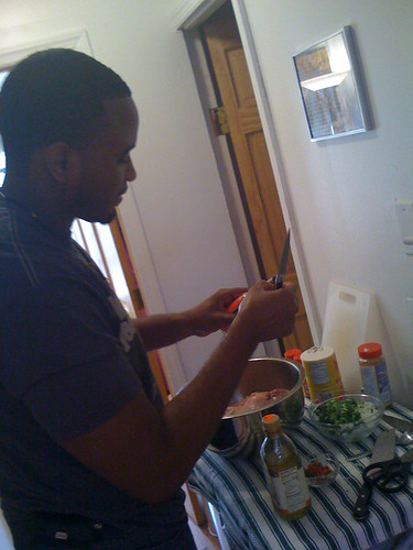Chef Mac (Omarr) prepping Jamaican Curry Chicken when he taught me the recipe in 2009