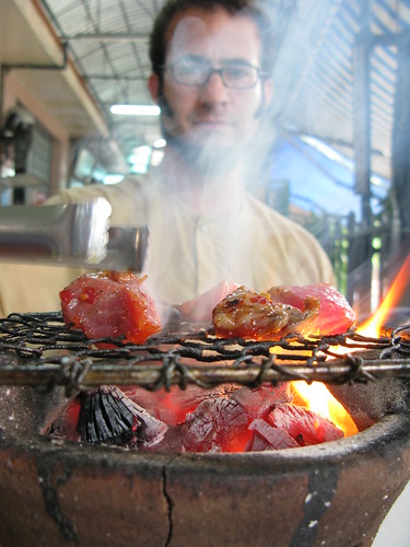 Grilling some meat at Lac Canh, Nha Trang, Vietnam