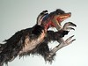 Dinosaurio con plumas