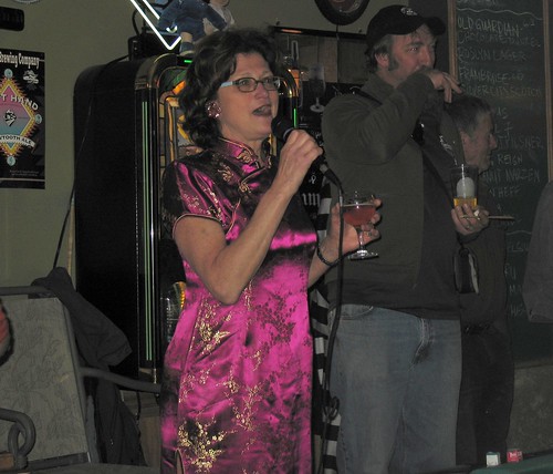 Appropriately dressed for sushi night, Carol Stoudt addressing the crowd alongside Elysian's Dave Buhler.