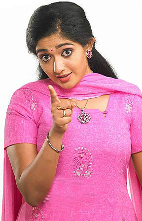 actress Kavya Madhavan in pink dress
