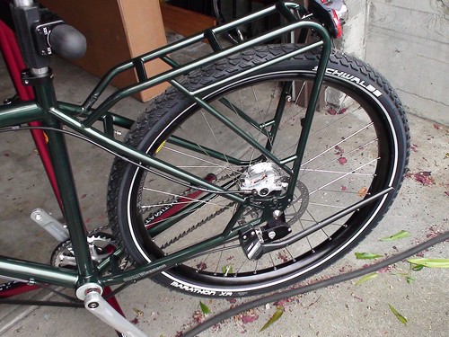Neighbor Tom's Bike: integrated stainless steel rack