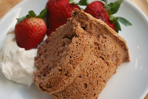 Chocolate Angel Food Cake - light and fluffy chocolate cake. Perfect with summer strawberries and fresh whipped cream!
