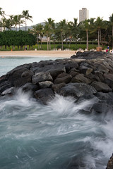 Waves Splashing onto Waikiki Rocks