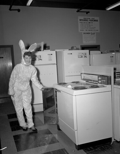 Lowes of Richmond, woman in bunny suit showing a stove