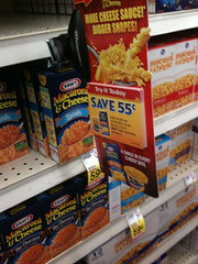 Grocery Coupons - Tearpad shelf display of cou...