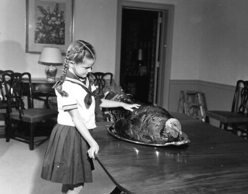 Governor Collins' daughter Darby with Thanksgiving turkey at mansion: Tallahassee, Florida