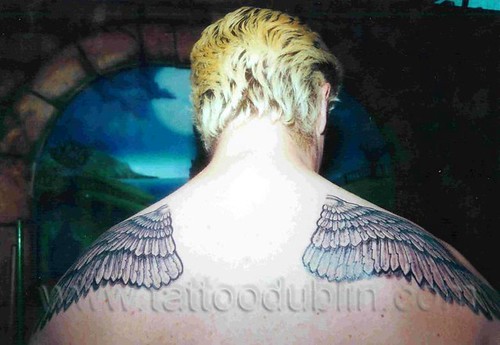 tattoo on back wings. angel wings back tattoo