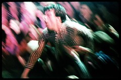 Lux Interior of The Cramps, dives into the audience at Mabuhay Gardens, San Francisco, 1978.