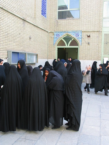 Veiled Iranian women line up for voting