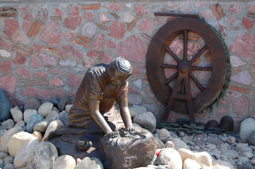 Sculpture of man working in Puerto Vallarta Mexico