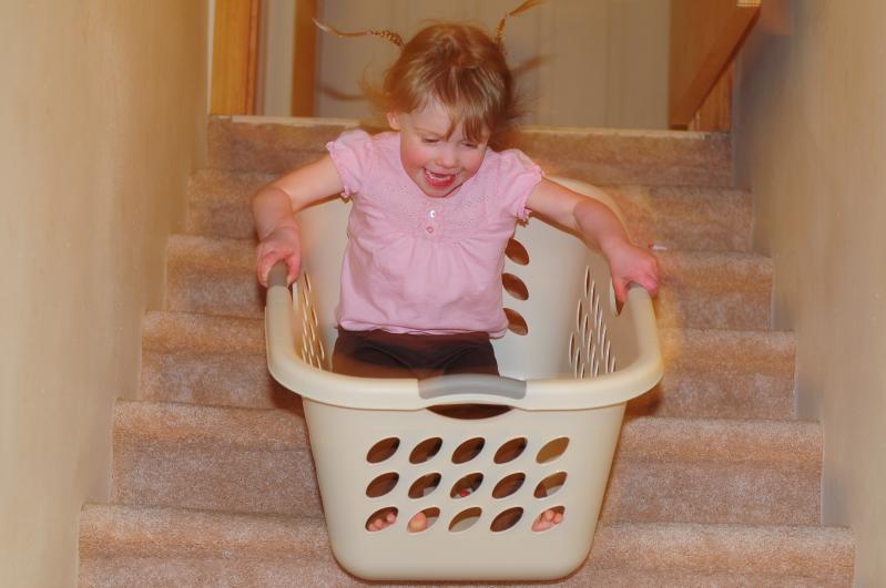 Riding down the stairs in a basket