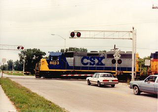 Northbound CSX Transportation Company freight train. Alsip Illinois. August 1990.