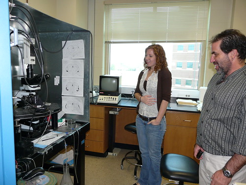 Hillary shows off her neuroscience lab to Alan Levine
