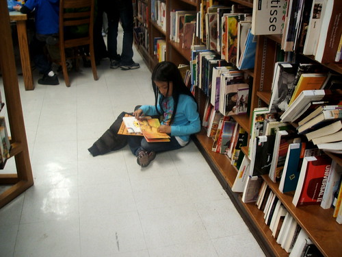 girl reading picture books