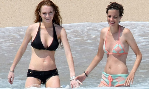Friends Lindsay Lohan and Samantha Ronson in bikini on the beach