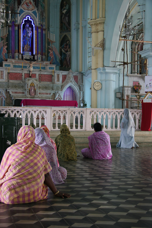 Women worshipping in Our Lady of Ransom Church