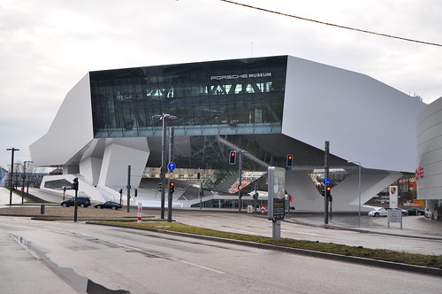 The monolithic Porsche Museum in Porscheplatz Stuttgart rises dynamically 