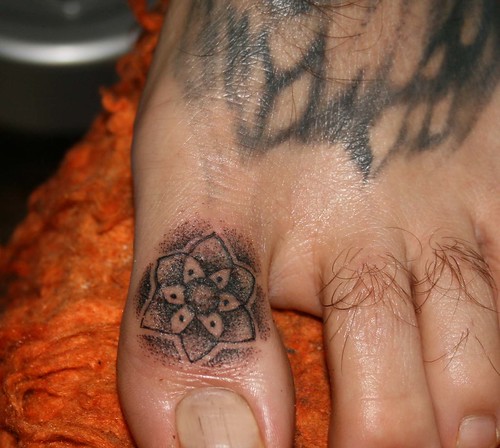 toe tattoos. freehand tiny toe tattoo