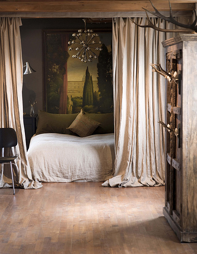 Dutch design: Luxe drapes and lush neutrals in gorgeous canal house bedroom
