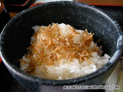 Close-up of the rice, served with small salted fish