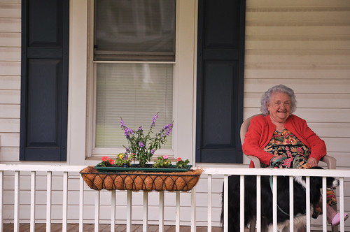 Betty Jones sits on her porch with her dog Babe on Main Street in Mt. Airy, Maryland. 