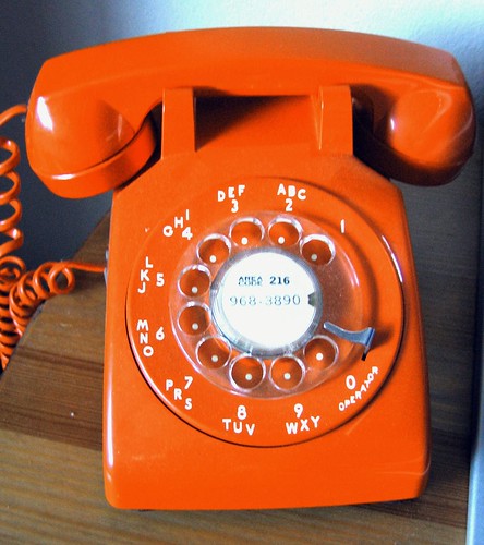 Orange Rotary Phone by redgiantsfan.