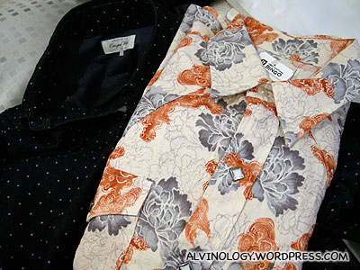 I bought the flower shirt from a second-hand clothing store; the blue shirt was bought at Uniqlo the night before