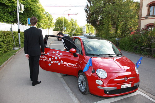 They had these cute cars branded with the symposium logos to drive people 