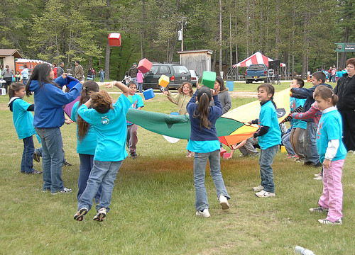 Menominee children enjoy their play at the LMIC kickoff.