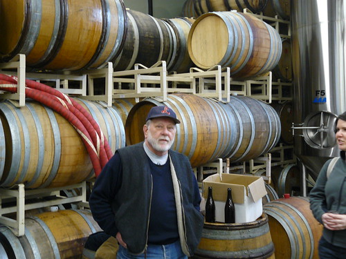 Owner Art Larrance with barrels of goodness at Raccoon Lodge/Cascade Brewing in Portland.
