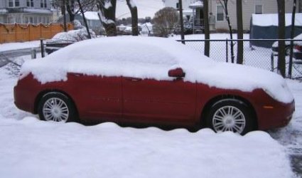 Snow and Ice Covered Car