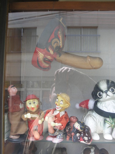 Phallic Figures in a window in Koenji
