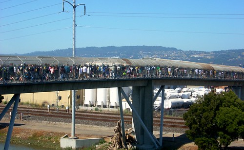 Fans leaving Oakland Athletics game to catch a train