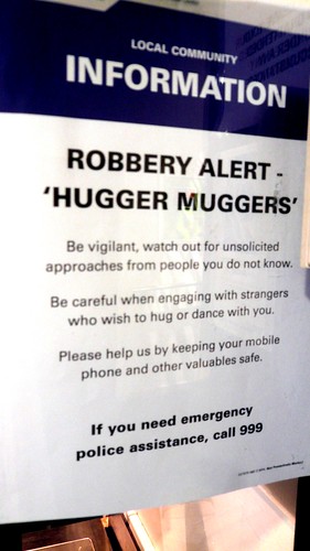Hugger Mugger police warning, Odeon Cinema, Leicester Square, London, UK por gruntzooki.